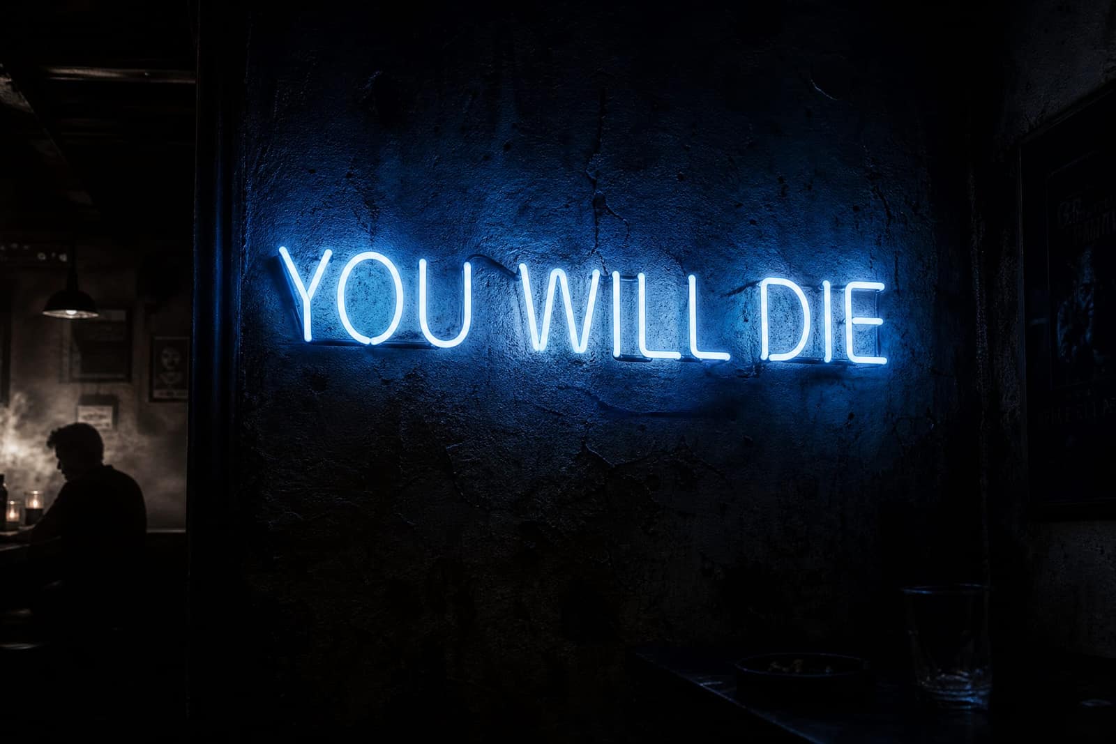 YOU WILL DIE neon sign in a dive bar